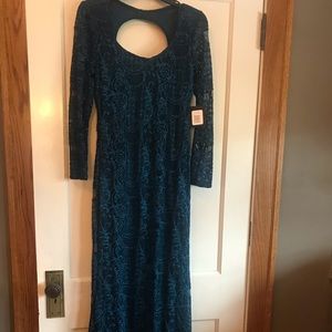 Beautiful teal formal dress. Never worn.